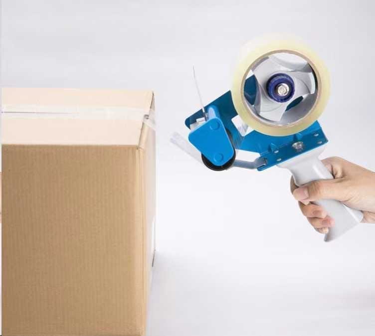 Handheld tape gun dispenser with clear tape