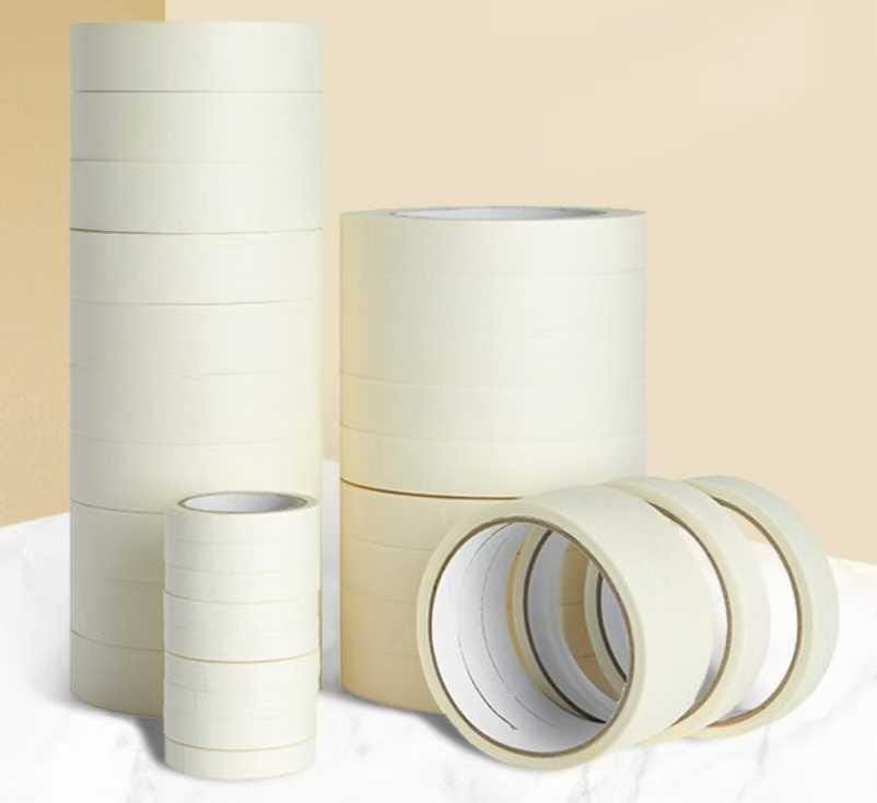 Masking tape rolls, warm studio lighting